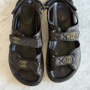 CHANEL Dad Sandals
Black Grained Calfskin Sandals